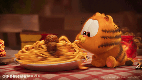 A Picture Of Garfield Eating Spaghetti And Meatballs From A Plate GIF