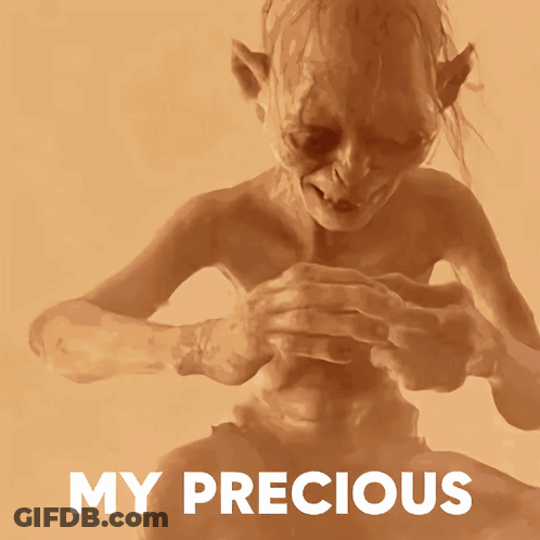 A Picture Of Gollum With The Words " My Precious " On The Bottom Right GIF