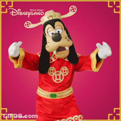 A Picture Of Goofy From Disneyland In A Red And Gold Outfit GIF