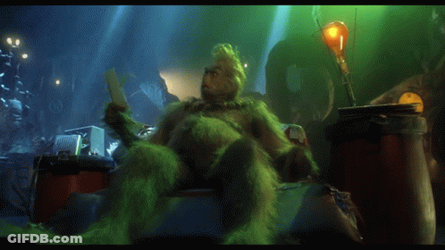 A Picture Of Grinch Reading A Book With The Words On Such Short Notice Above Him GIF