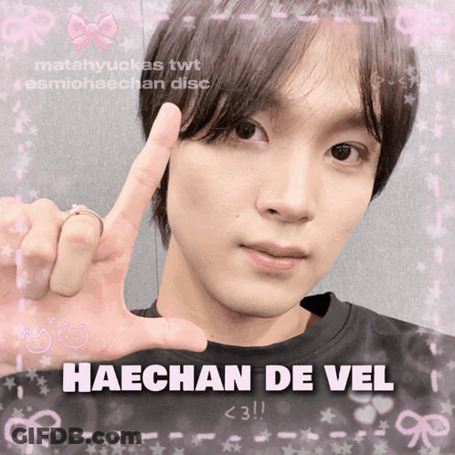 A Picture Of Haechan De Vel Is Surrounded By Pink Stars GIF