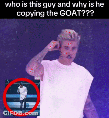 A Picture Of Justin Bieber On Stage With The Caption Who Is This Guy And Why Is He Copying The Goat GIF