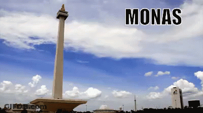 A Picture Of Monas With A Tower In The Foreground GIF