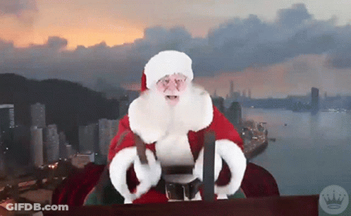 A Picture Of Santa Claus With A Crown On It GIF