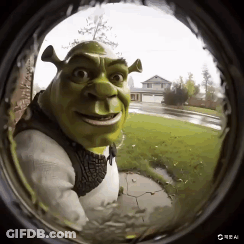 A Picture Of Shrek Looking Through A Doorbell GIF