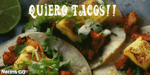 A Picture Of Tacos With The Words Quiero Tacos Written On It GIF