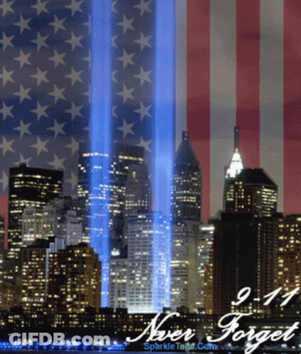 A Picture Of The Twin Towers With The Words Never Forget GIF