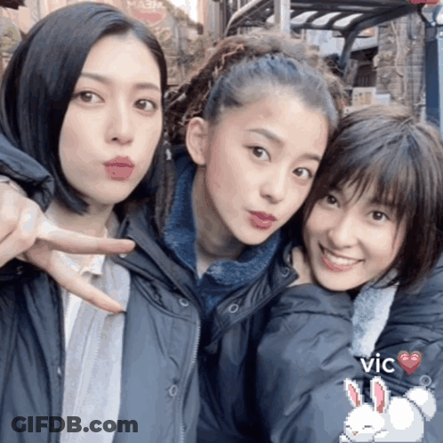 A Picture Of Three Girls With The Word Vic On The Bottom Right GIF