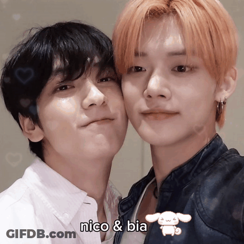 A Picture Of Two Boys With The Caption Nico And Bia GIF
