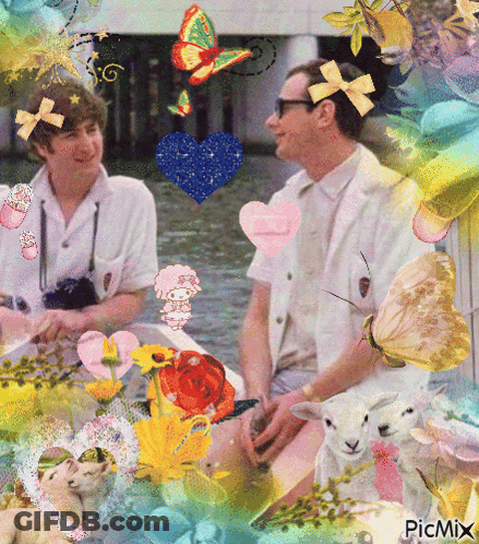 A Picture Of Two Men Surrounded By Flowers And Butterflies With The Words Picmix On The Bottom GIF