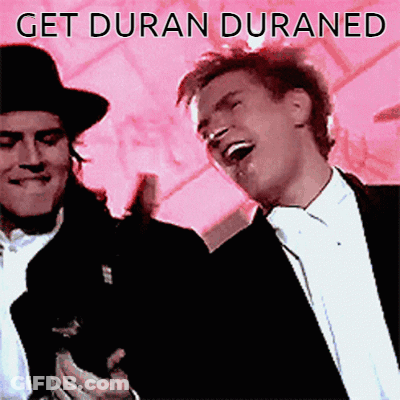 A Picture Of Two Men With The Words Get Duran Duraned GIF