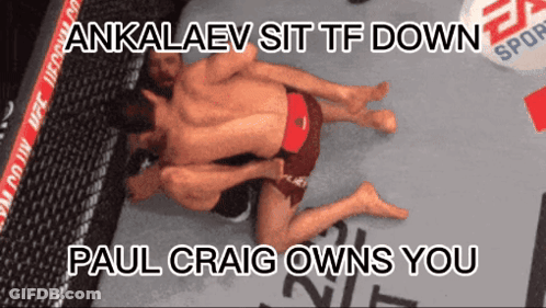 A Picture Of Two Men Wrestling With The Caption Ankalev Sit Tf Down GIF