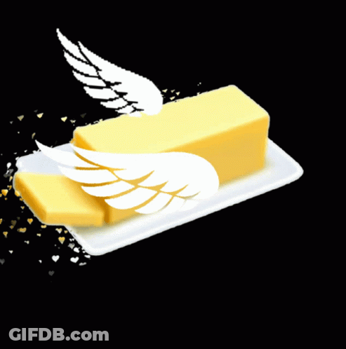 A Piece Of Butter With Wings On It On A Plate GIF