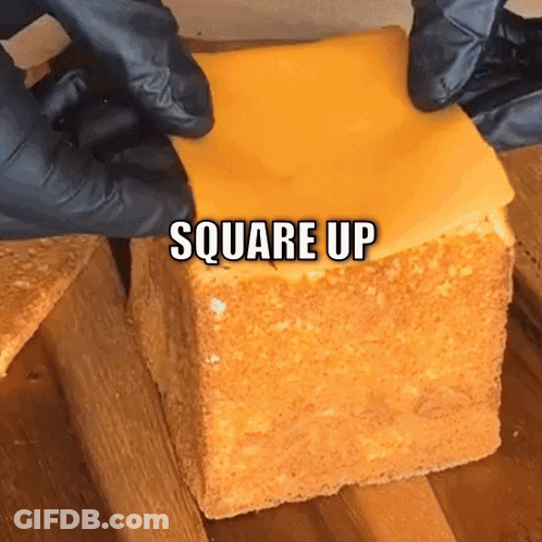 A Piece Of Cheese Is Being Placed On A Piece Of Bread With The Words Square Up Below It GIF