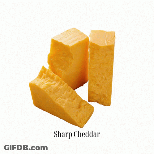 A Piece Of Honey Goat Gouda Is Shown On A White Background GIF