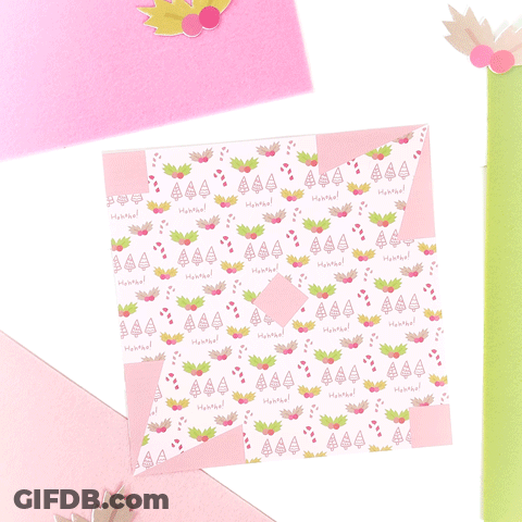 A Piece Of Paper With A Pattern Of Ice Cream Cones And Pineapples On It GIF