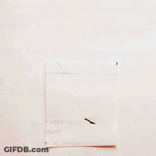 A Piece Of Paper With The Letter M Written In Black Marker GIF