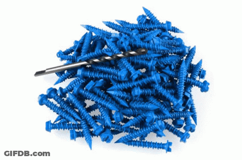 A Pile Of Blue Screws And A Drill GIF
