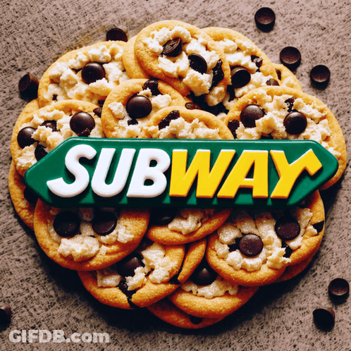 A Pile Of Cookies With A Subway Sign In The Background GIF