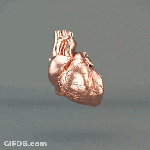 A Pile Of Copper Pieces Flying In The Air On A Gray Background GIF