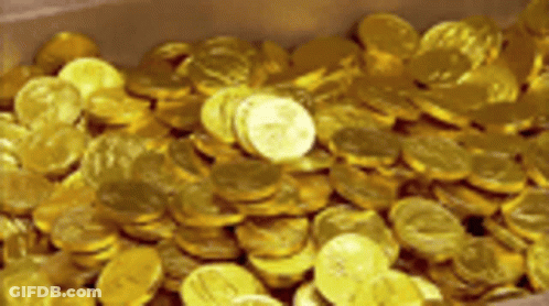 A Pile Of Gold Coins In A Box With One Coin That Says ' A ' On It GIF