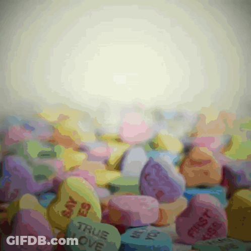 Heart Shaped Candy With True Love Text GIF