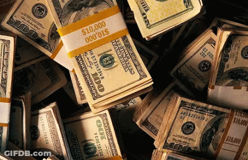 A Pile Of Stacks Of 100 Dollar Bills With One Stack Being Worth $ 10,000 GIF