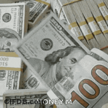 A Pile Of Stacks Of 100 Dollar Bills With The Words Money M On The Bottom GIF
