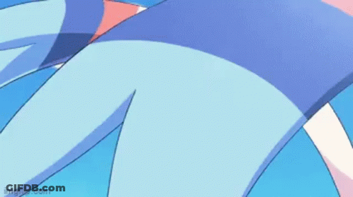 A Pink And Blue Pokemon Is Standing In A Field Of Flowers . GIF
