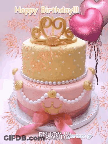 A Pink And Gold Birthday Cake With The Words Happy Birthday Written Above It GIF