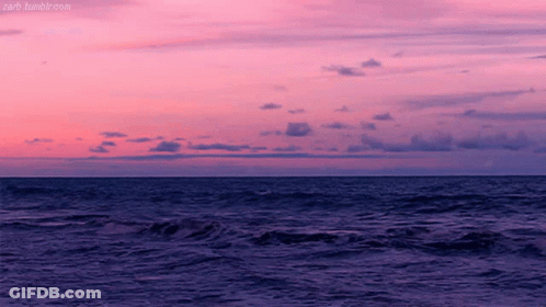 A Pink And Purple Sunset Over The Ocean With A Tumblr.com Link GIF
