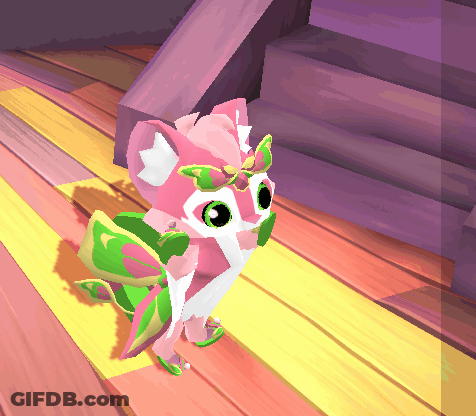 A Pink And White Cartoon Character With Green Wings GIF