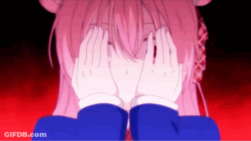 A Pink Anime Girl Is Covering Her Face With Her Hands . GIF