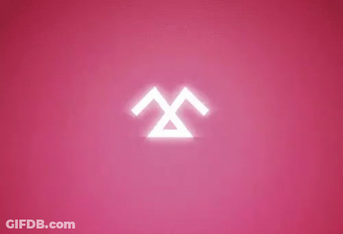A Pink Background With A Glowing Face On It GIF