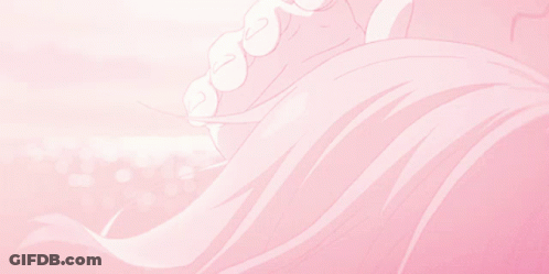 A Pink Background With A Person 'S Teeth And Hair GIF