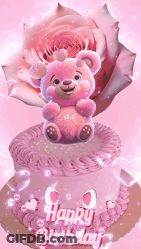 A Pink Birthday Cake With A Pink Teddy Bear On Top GIF