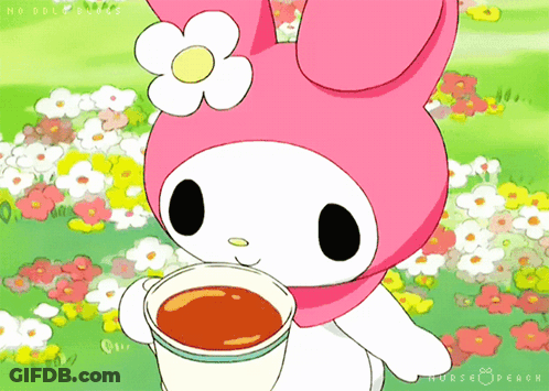 A Pink Bunny With A Flower On Her Head Is Drinking From A Cup GIF