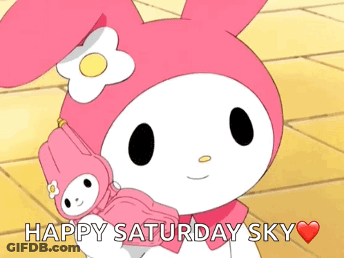 A Pink Bunny With A Flower On Her Head Is Holding A Stuffed Animal With The Words Happy Saturday Sky Above Her GIF