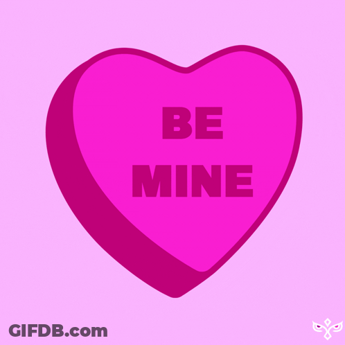 A Pink Candy Heart That Says Be Mine On It GIF