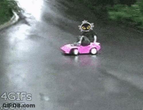 A Pink Car Is Driving Down A Road With A 4Gifs.com Watermark GIF