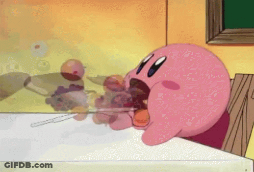 A Pink Cartoon Character Is Sitting At A Table With A Knife And Fork In His Mouth GIF
