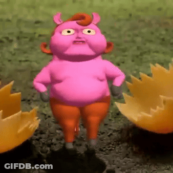 A Pink Cartoon Character With A Big Belly Is Standing In The Dirt GIF