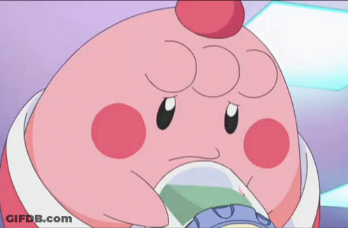A Pink Cartoon Character With A White Egg In Its Mouth Is Smiling GIF