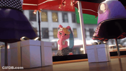 A Pink Doll Is Standing In Front Of A Window With A Red Umbrella GIF