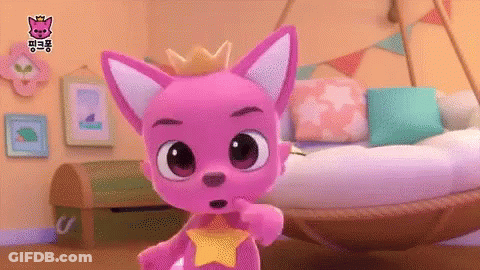 A Pink Fox With A Crown On Its Head Is Standing In A Room GIF