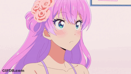 A Pink Haired Anime Girl With A Flower In Her Hair GIF