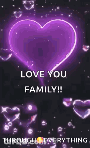 A Pink Heart Is Glowing In The Dark And Says `` Love You Family '' . GIF
