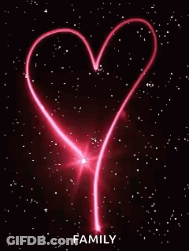 A Pink Heart Is Surrounded By Stars On A Black Background With The Word Family Written Below It . GIF