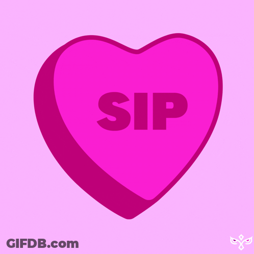 A Pink Heart Shaped Candy With The Word Sip On It GIF