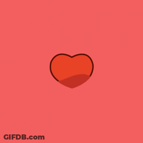 A Pink Heart With A Red Heart In The Center GIF